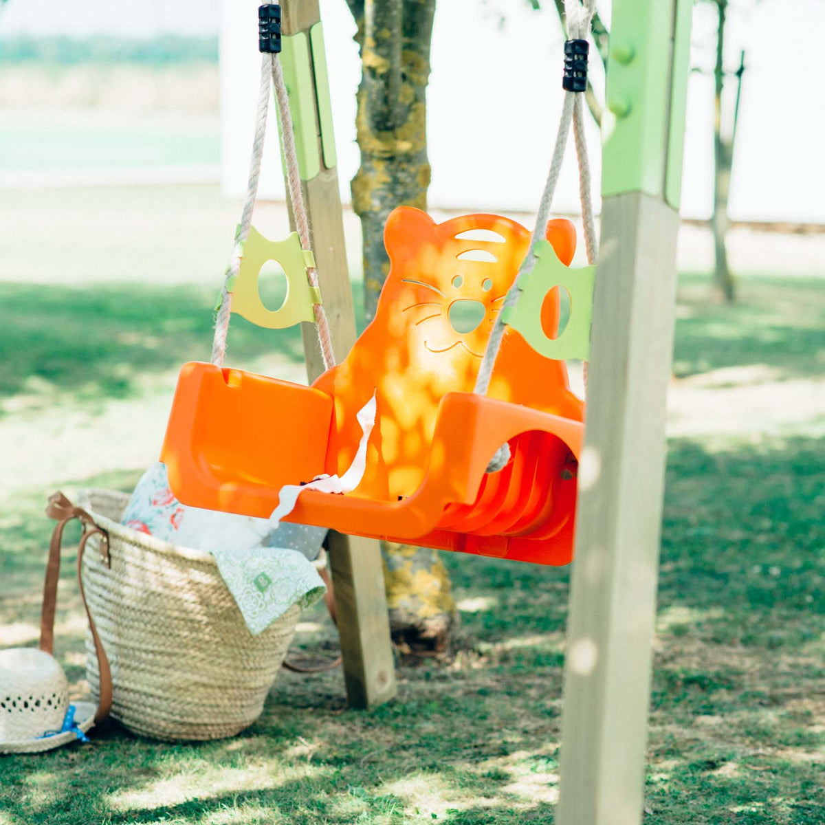 Animal themed seat in orange colour of Plum Play's Wooden Growing Swing Set