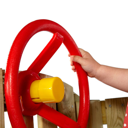 Close-up of the colorful steering wheel accessory in Plum Play's Toddlers Tower Wooden Climbing Frame