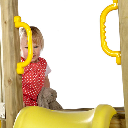 Yellow handles at the top of the slide in Plum Play's Toddlers Tower Wooden Climbing Frame for additional safety