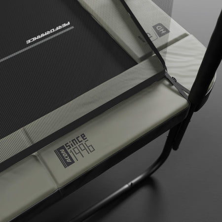 Corner section detail of the Acon 13 HD PRO trampoline padding system, showcasing the thick protective covering and precision construction quality.