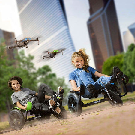 Children happily playing and riding in BERG Street-X Pedal Go-Karts